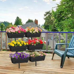 Black finish ETELI planter looks sleek on patios and balconies.
