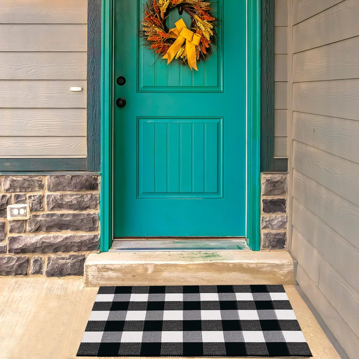 Euoloar rug showing sun-resistant plaid colors for outdoor use
