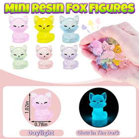 EVDERS resin fox collection in varied colors enhances potted plant displays.