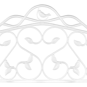 Evelyne black-finish panel blends with pathways and beds for contrast.