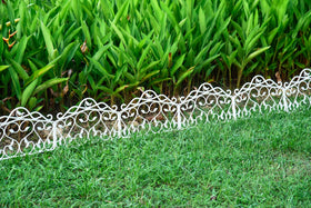 Evelyne ground-spikes provide stable anchoring for durable edging.