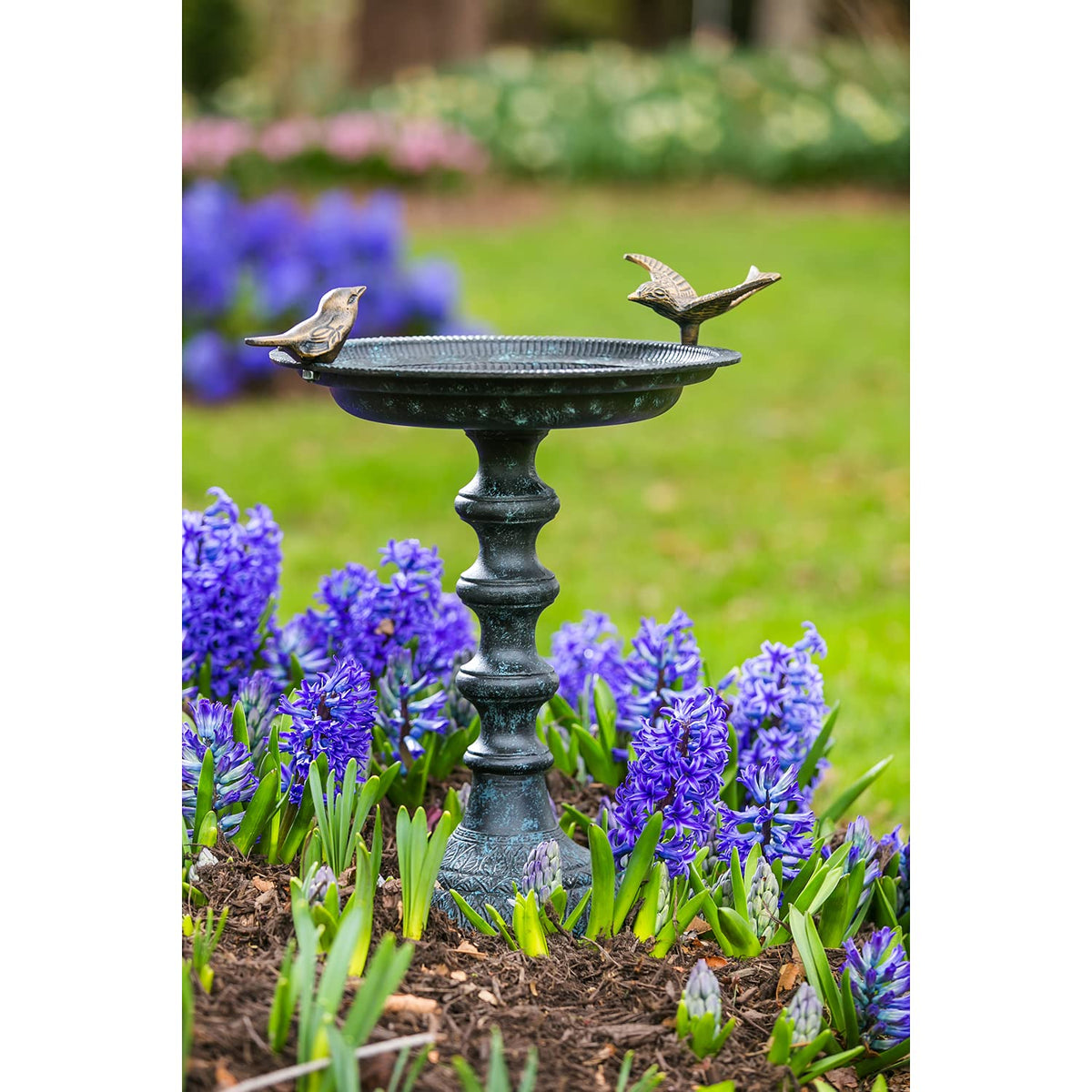 Side view of Evergreen Garden bird bath stand for sturdy display