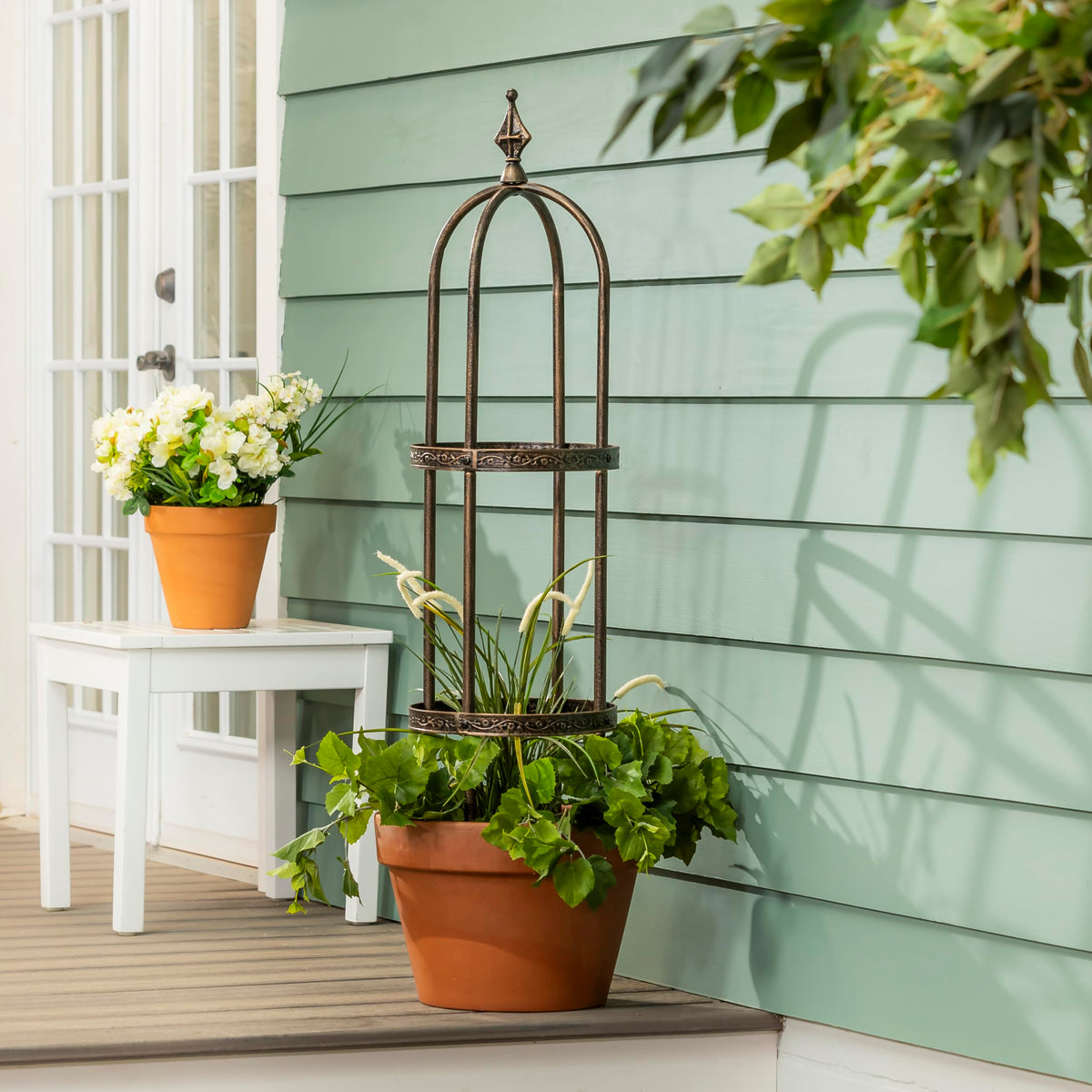 Close-up of bronze finish and weatherproof steel of Evergreen Garden trellis