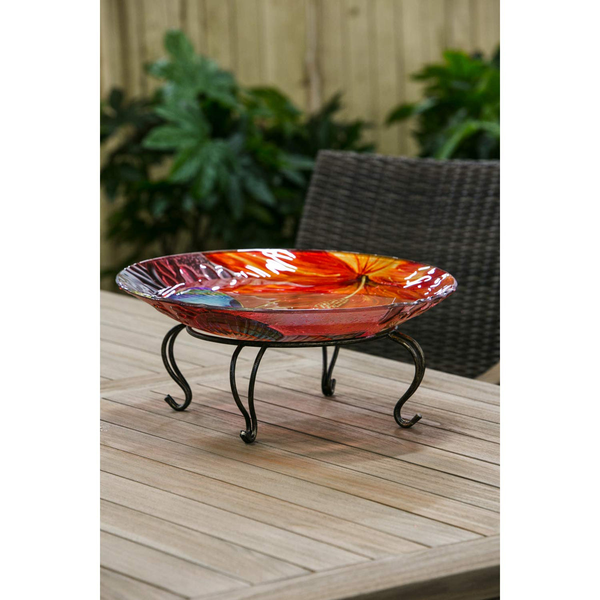 Evergreen Garden dark gold and black pedestal, outdoor-ready for garden or patio display.