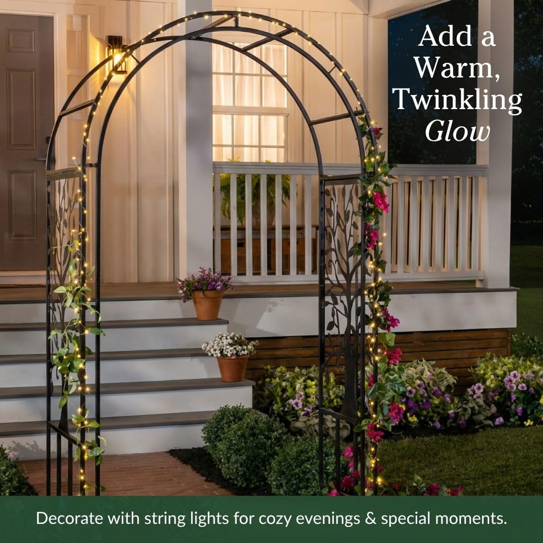Evergreen steel-frame garden arch offers durability for year-round garden structure.