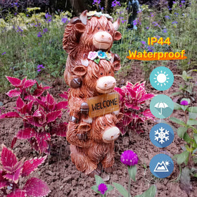 Evursua Highland Cow yard display creates cozy patio ambiance.