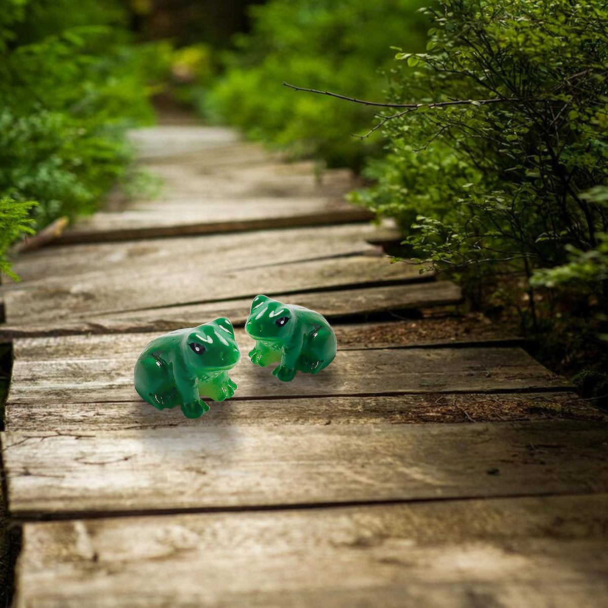 Exasinine fairy garden frog figurine adds playful detail to home decor.