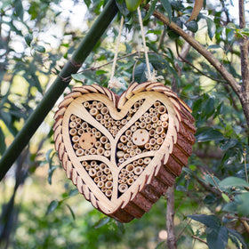 Execabe Mason Bee House with heart design inviting mason bees to nest in your garden