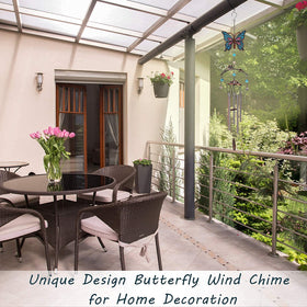 Exrisiry glitter butterfly detail on wind chime adds delicate charm.