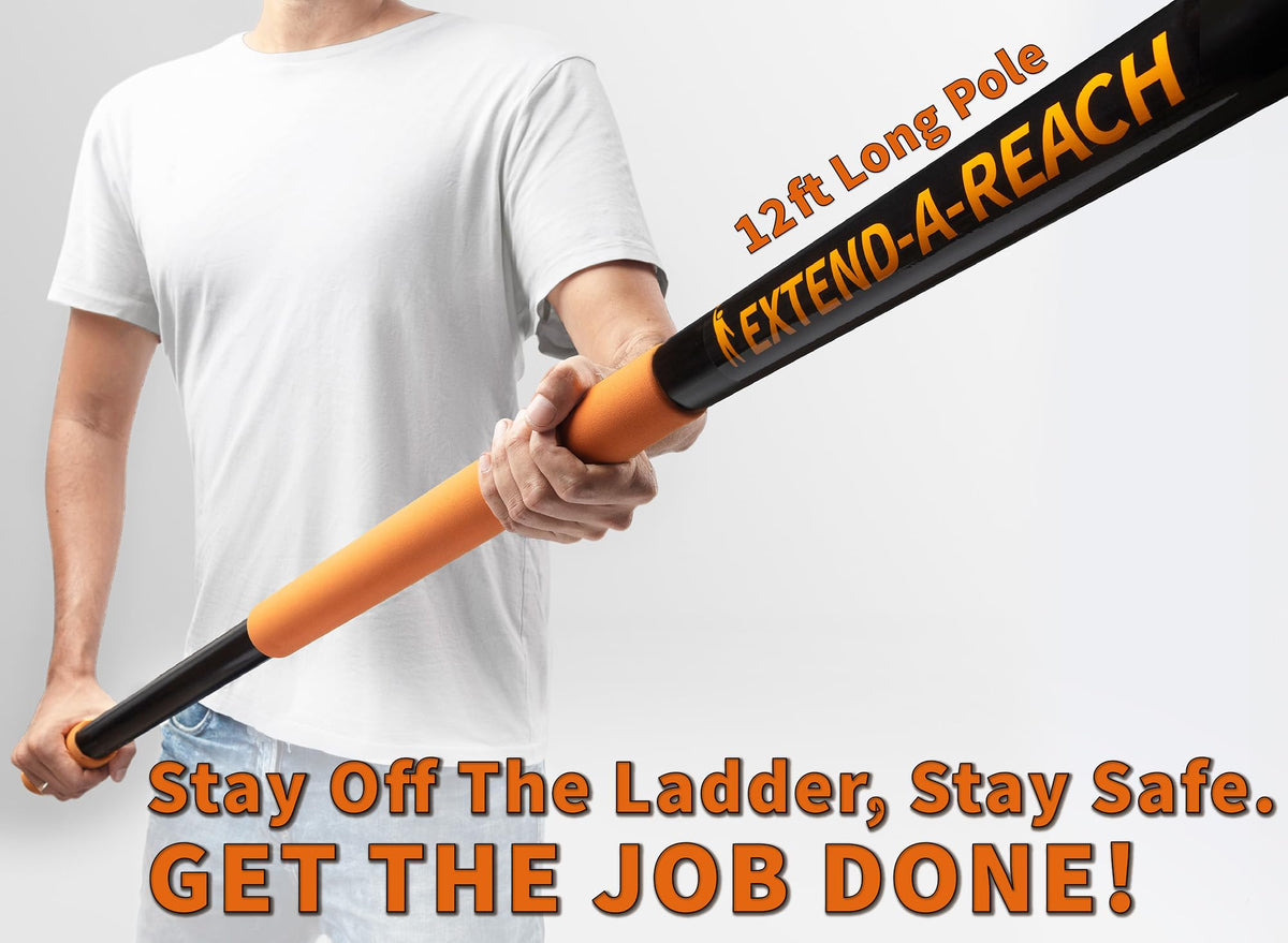 EXTEND-A-REACH collapsible rake deployed at full length for high roof cleaning.