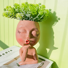 EylbKey face pot featuring anti-friction pads to protect furniture.