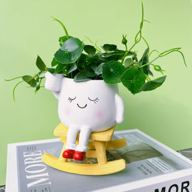 EylbKey Cute Rocker Planter with opening, ideal for small succulents.