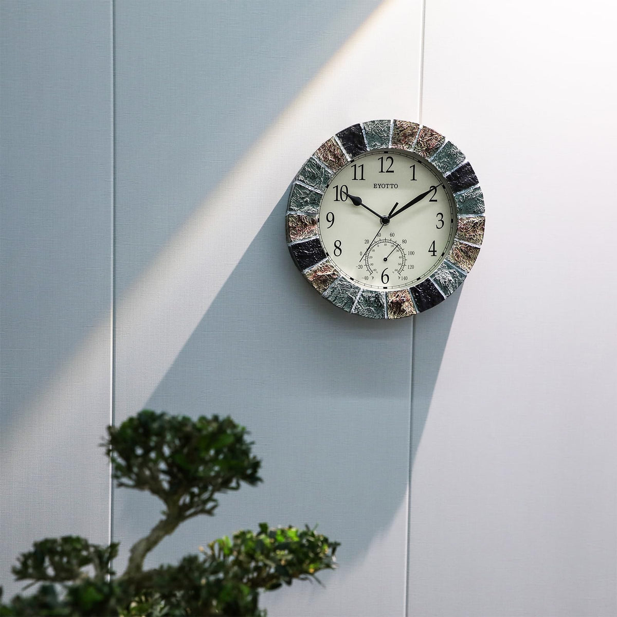 eYotto durable weatherproof wall clock suitable for patio, garden, and bathroom spaces