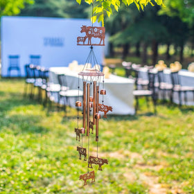 EZTZEN eztzen cow wind chimes six small cows plus one large cow.