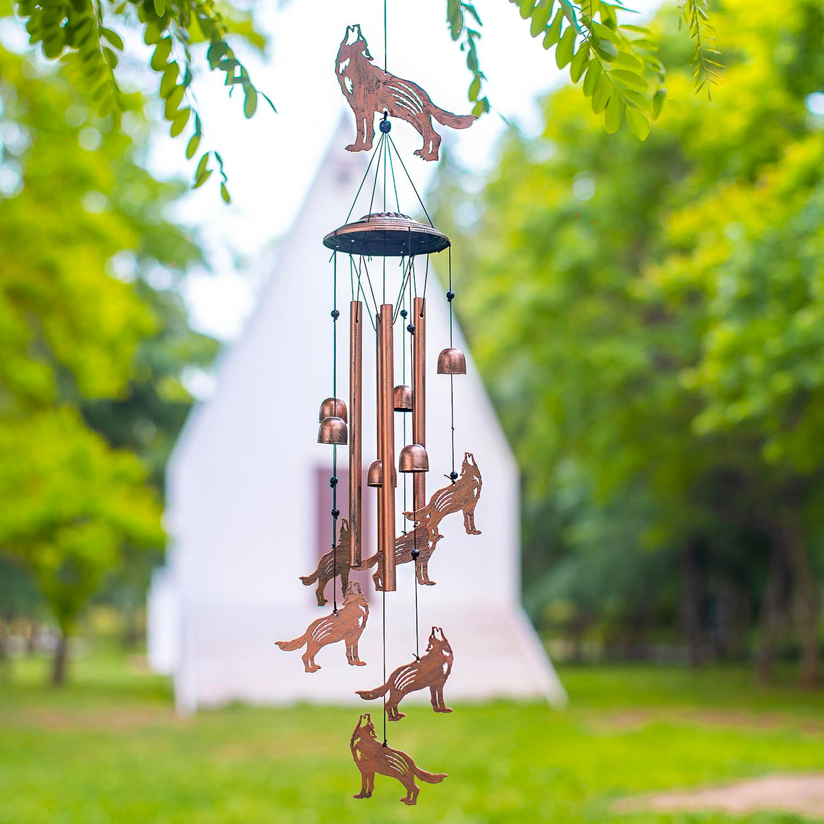 EZTZEN Wolf wind chimes hanging near porch evoke peaceful outdoor moments.