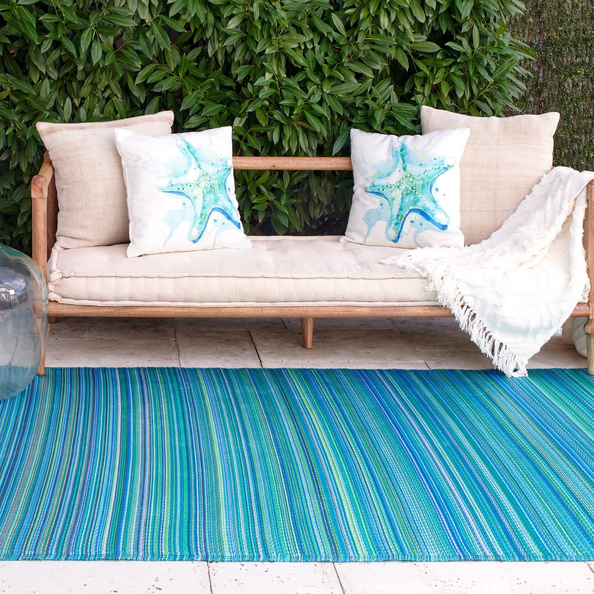 Fab Habitat Cancun turquoise-moss stripe rug for patios, fade-resistant and easy to clean
