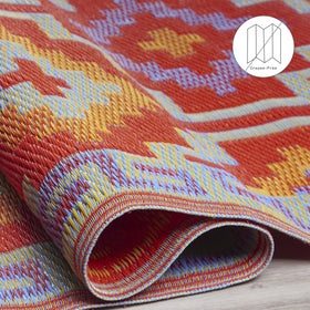 Fab Habitat crease-free rolled rug ready for storage with bands