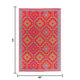 Fab Habitat Lhasa waterproof outdoor rug in orange and violet, easy to clean.