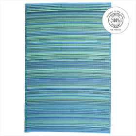 Fab Habitat striped rug used as kid-safe play surface on patio.