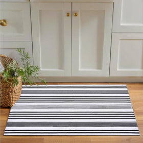 Fallovea front porch striped door mat enhancing curb appeal while withstanding weather.