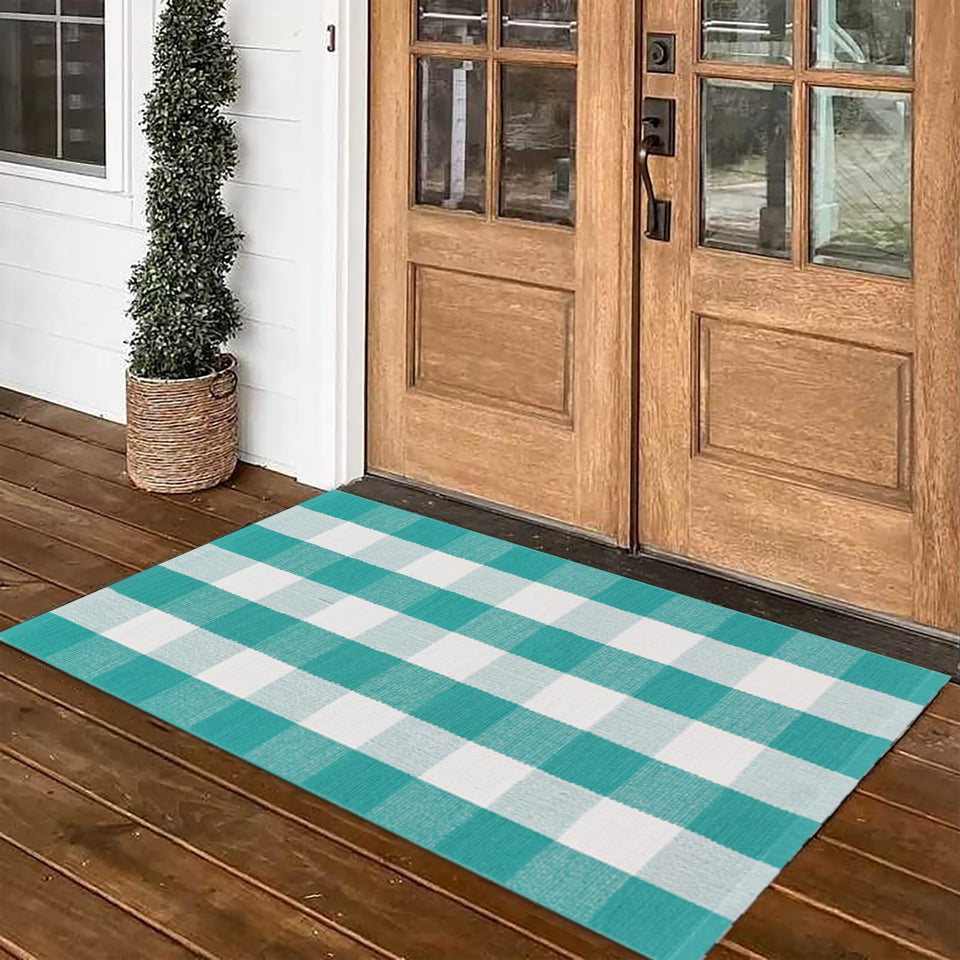 Fallovea green and white plaid rug on a front porch adds durable, welcoming style.