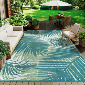 famibay outdoor rug includes four stakes for secure placement on windy days