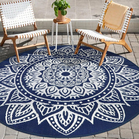 Famibay mandala-pattern round outdoor rug enhances boho patio space.