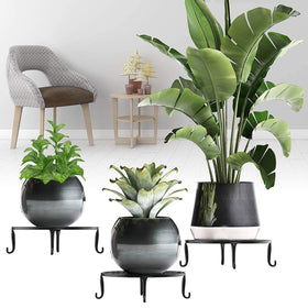 FAMIJOY 2-pack metal plant stands for versatile display in home or garden.