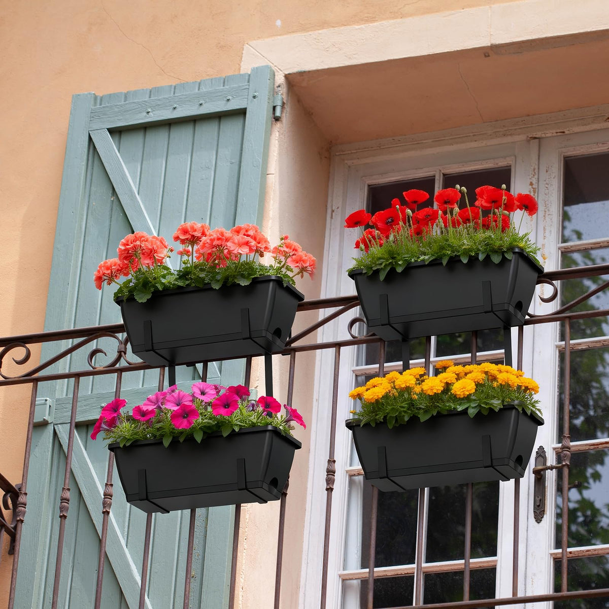 Fansxivita deck railing planter with black stand supports vibrant flowers on a sunny deck