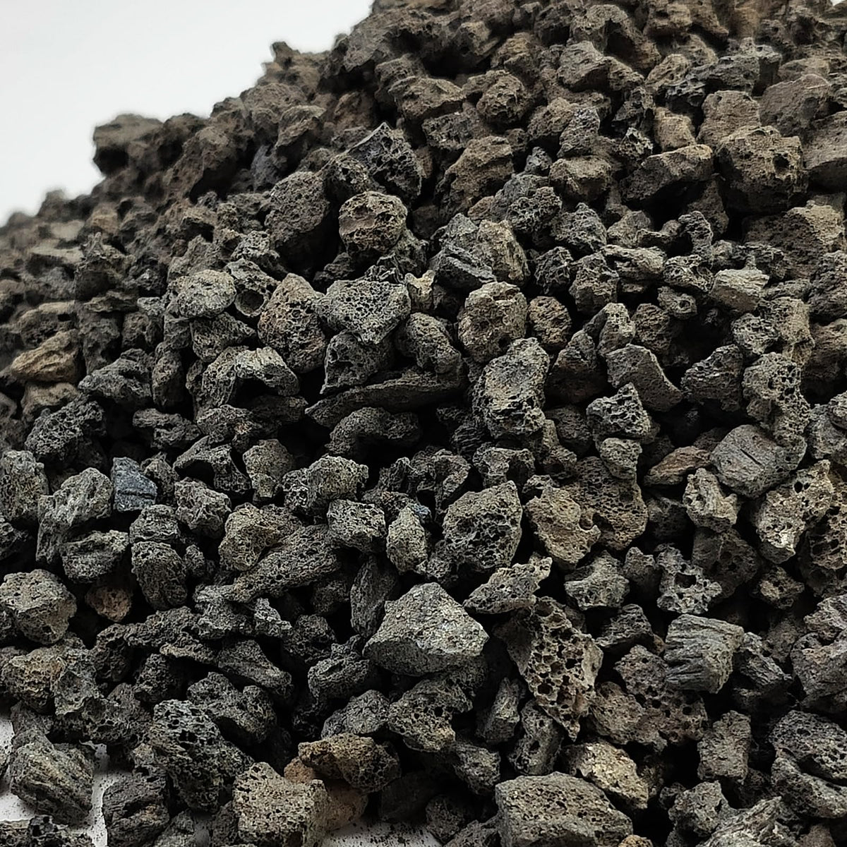 FANTIAN black lava rocks for fire pits showing porous texture and dramatic contrast
