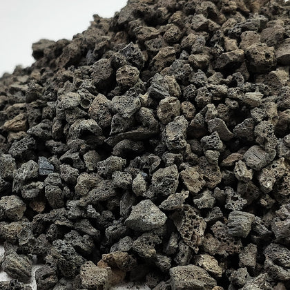FANTIAN black lava rocks for fire pits showing porous texture and dramatic contrast