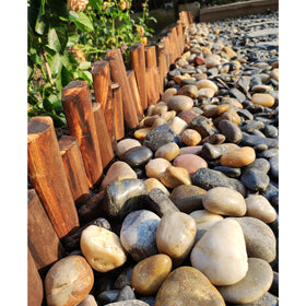 FANTIAN footpath pebbles provide smooth, safe walkways for barefoot use.