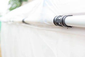 Farm Plastic Supply clamp assists cold-frame assembly with ABS pipes.