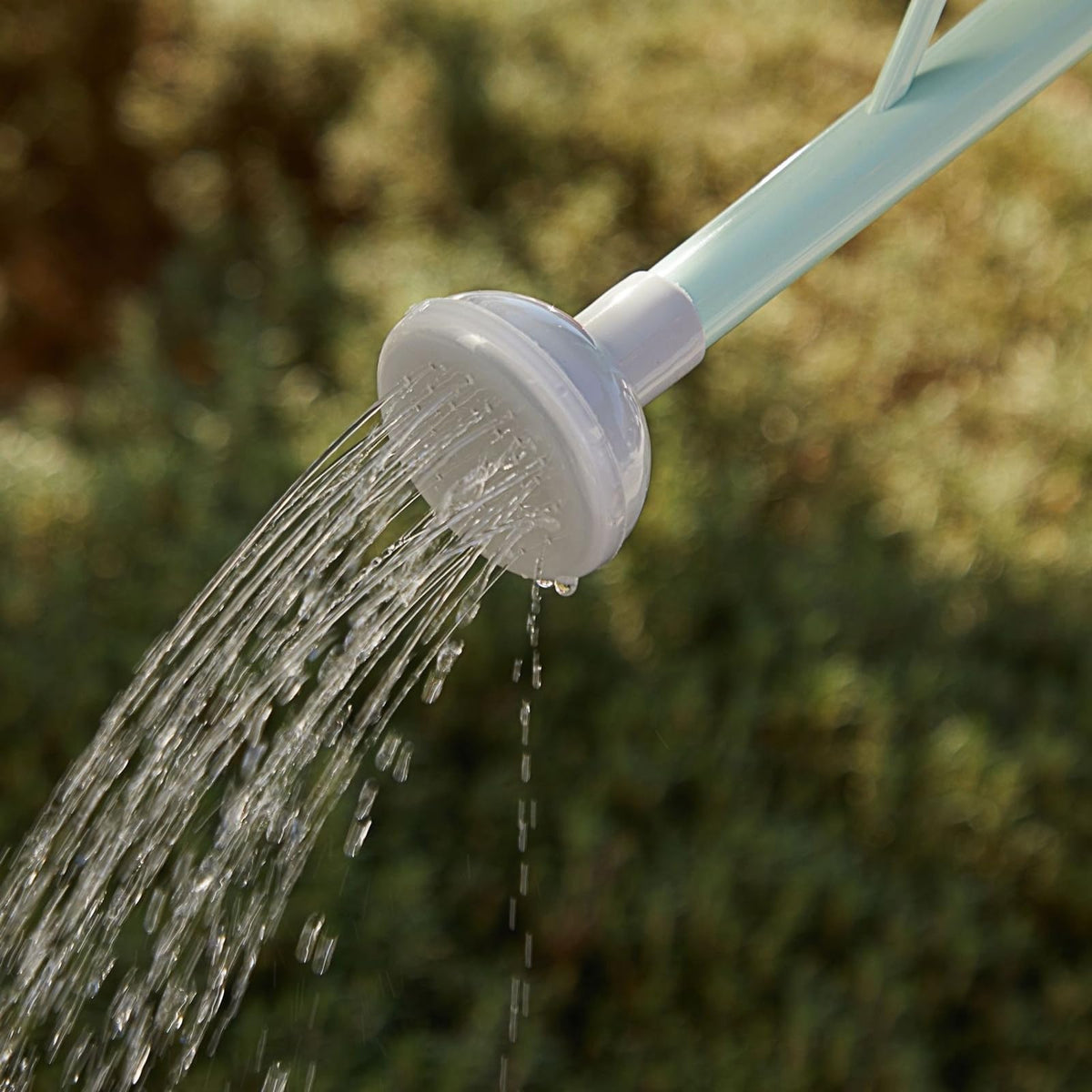 Farmlyn Creek kids watering can encouraging hands-on gardening