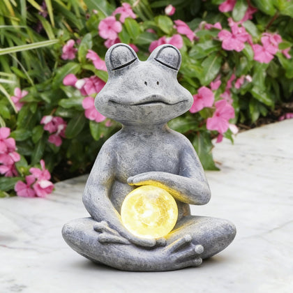 Fashionoda meditating yoga frog statue with solar LED light for outdoor ambiance.