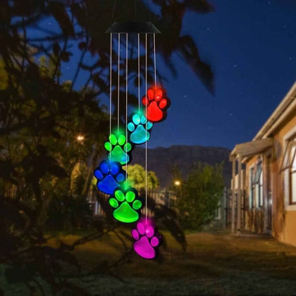 fasohere paw print solar wind chimes panel with six illuminated paw prints at night