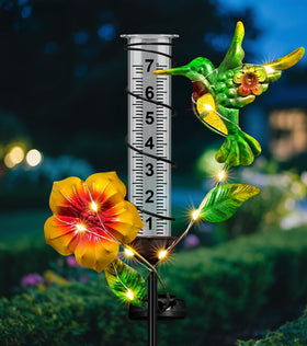 Fastruggle rain gauge with hummingbird night lights enhances garden ambiance