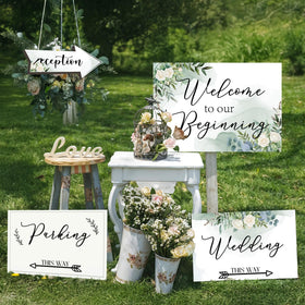 Fayavoo Wedding sign with bold lettering directs guests to ceremony or reception