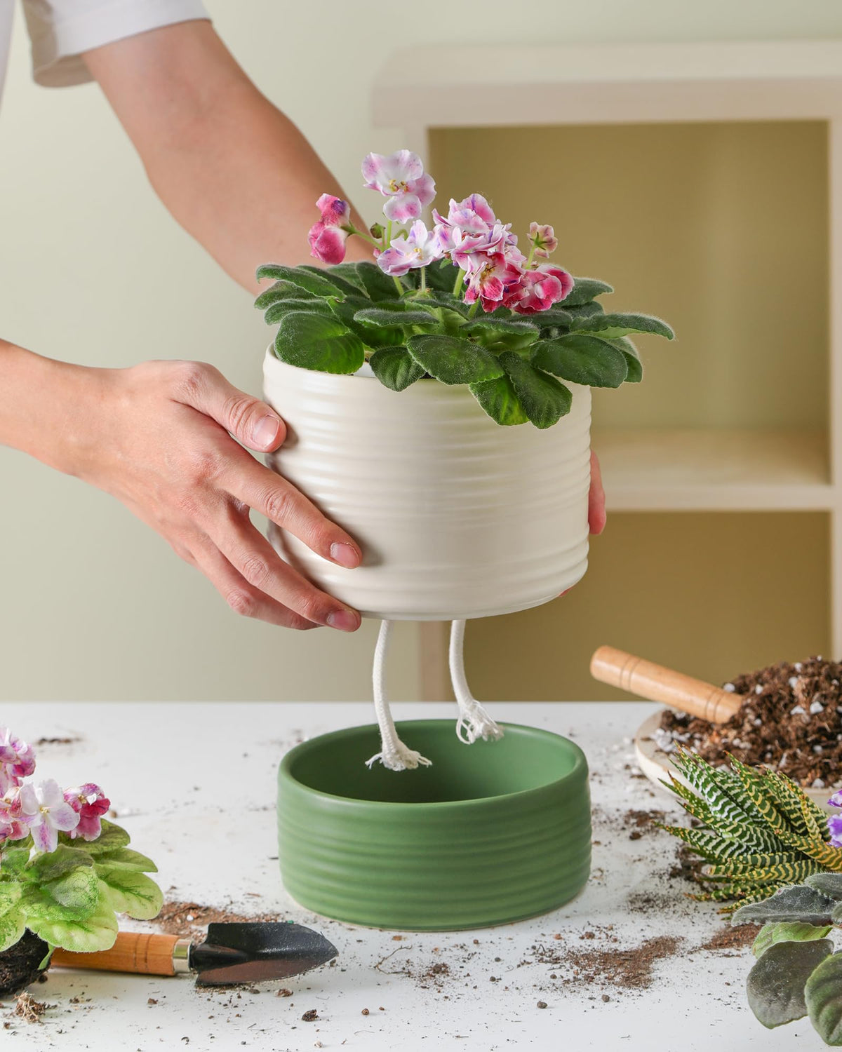 Fayoula wick rope and drainage focus helps regulate moisture with less daily watering.