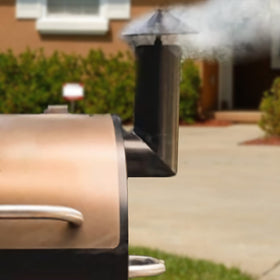 FCCUM grill smoke stack on pellet grill helps maintain heat and control.