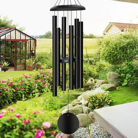 FDOCOI wind chimes outdoor 38-inch bronze in a sunny garden for peaceful ambience