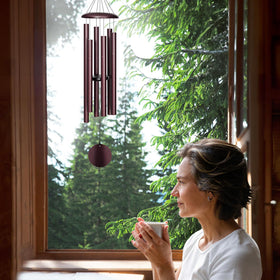 FDOCOI wind chimes hanging on a patio for breeze