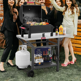 Feasto movable grill table folding side extension for extra workspace.