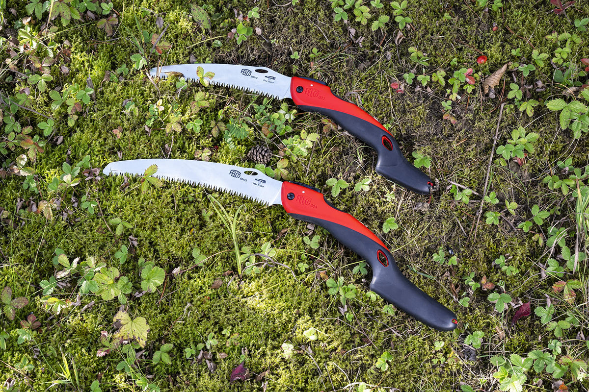 Felco 603 folding saw in pocket for portable pruning on site