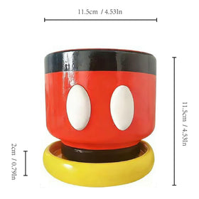 FelyHos cartoon mouse pot with yellow saucer brightens workspace.