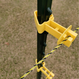 Fence Shock yellow insulator closeup showing durable, anti-UV plastic material.