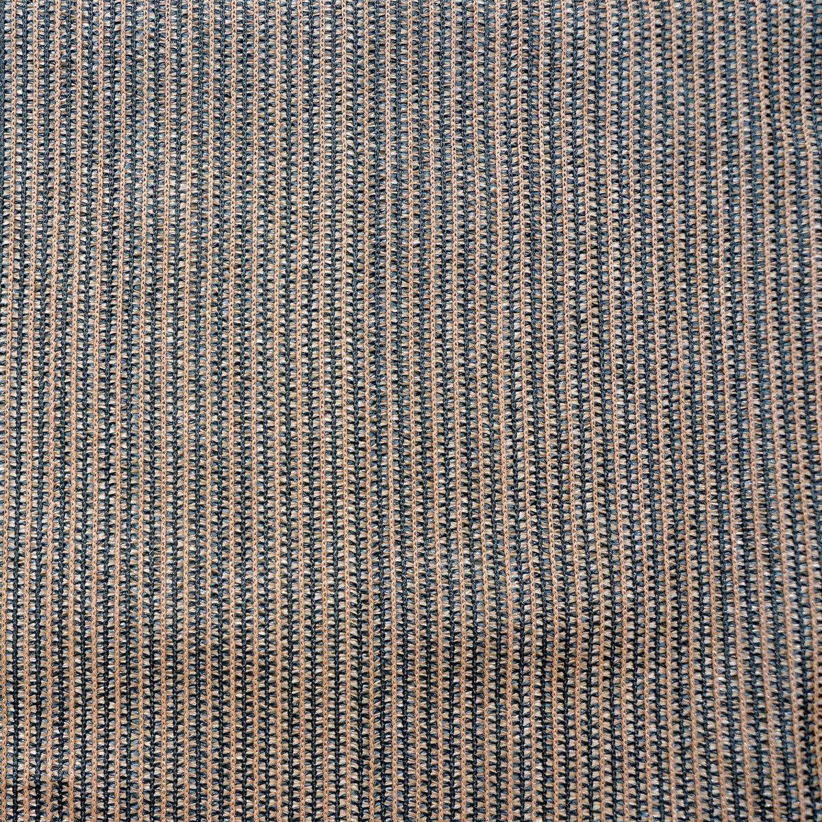 Fence4ever brown shade fabric roll in sunlight emphasizes lightweight durability