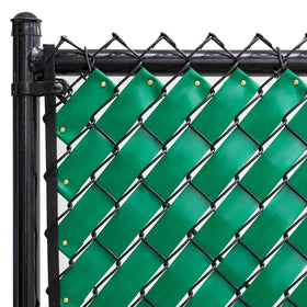 Fenpro Emerald Green chain-link privacy tape applied to a fence for outdoor privacy