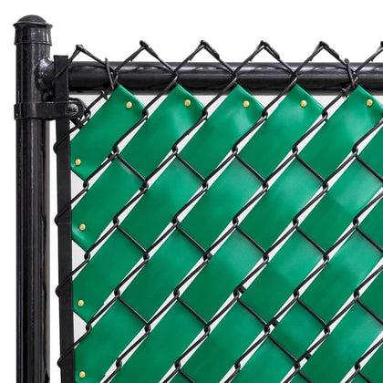 Fenpro Emerald Green chain-link privacy tape applied to a fence for outdoor privacy