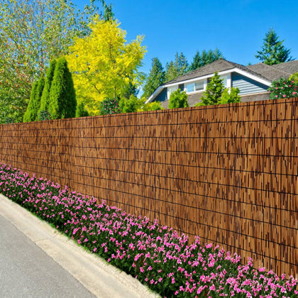 Fenrunxu bamboo reed fence in brown, 16.4 ft length, for backyard privacy.